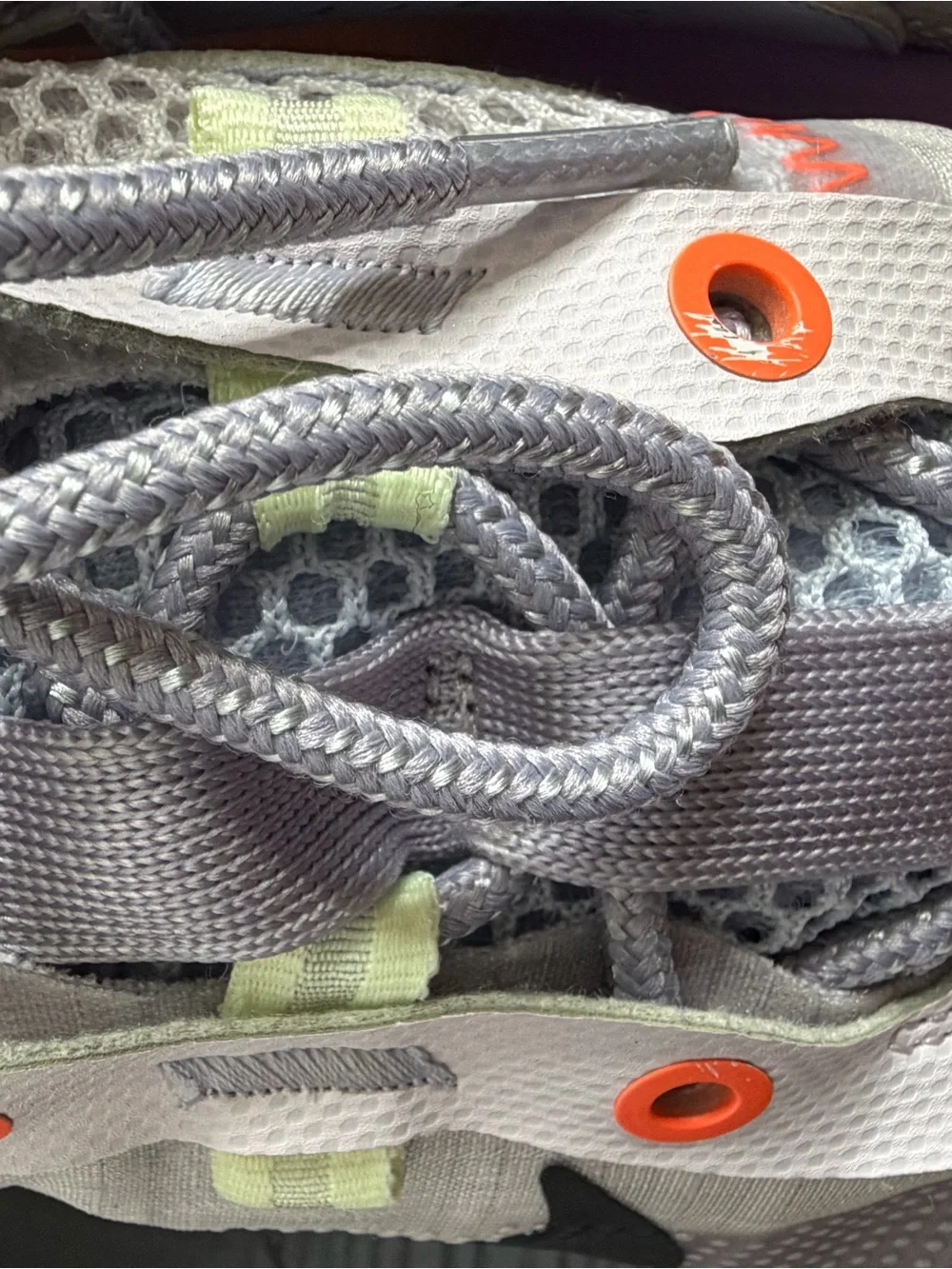 Nike Grey Athletic Sneakers with Black Swoosh and Orange Accents